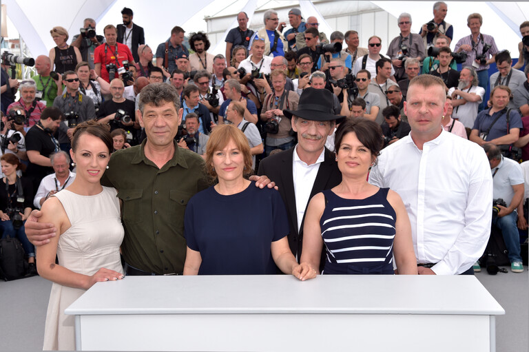 кан