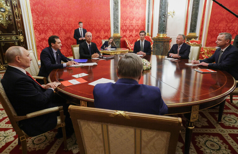 Путин