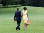 Барак и Мишел Обама се любуват един на друг на романтична вечеря