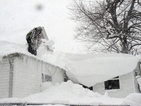 Щатът Ню Йорк, затрупан от снега, се готви за наводнение
