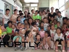 Китайка се грижи за 72 осиновени деца