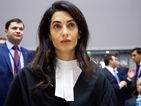 Съпругата на Джордж Клуни ще защитава сина на Кадафи