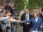 Разследват протестираща заради обиди към Меркел