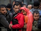 Бой между бежанци на опашка за помощи в Германия