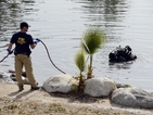 След стрелбата: Водолази претърсват езеро в Сан Бернардино