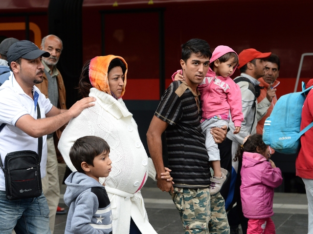 Мигранти, пристигащи на гарата в Мюнхен