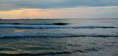 Морски изгрев след дъжда