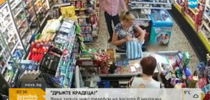 „Дръжте крадеца”: Жена с малко дете задига телефон на касата на магазин