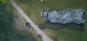 Гигантска фреска на пластмасова бутилка се появи край Женевското езеро (ВИДЕО)