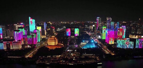 Зрелищно светлинно шоу освети Олимпийски спортен център в Китай (ВИДЕО)