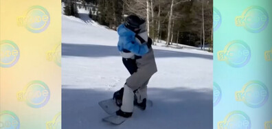 Шон Уайт носи Нина Добрев на ръце докато кара сноуборд