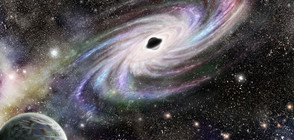 Супермасивна черна дупка погълна галактика-поничка